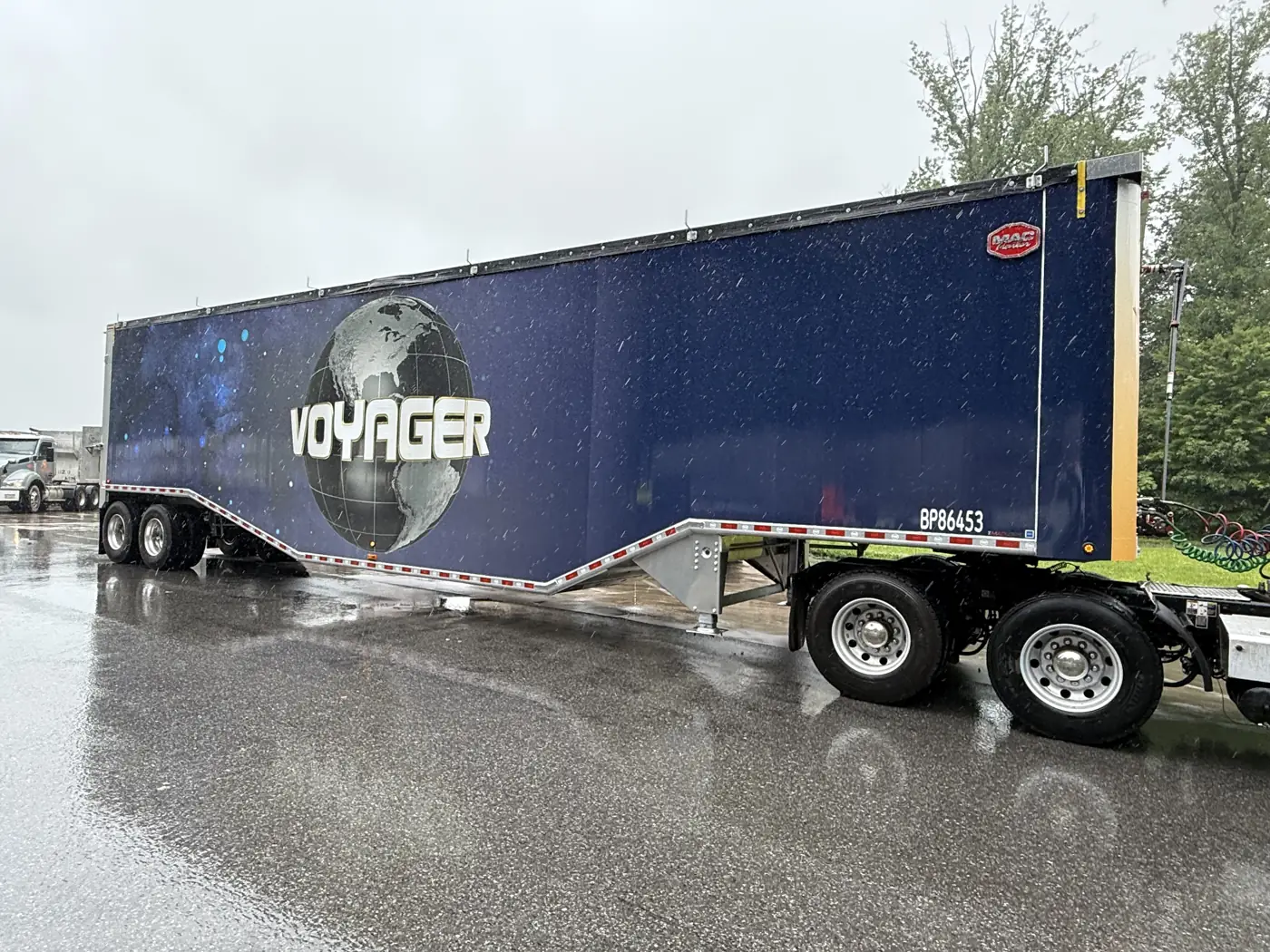 Voyager's galaxy-wrapped TipperMax transfer trailer in the yard